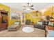 Comfortable living room with a view of the foyer, staircase, and kitchen at 2498 Highway 212, Covington, GA 30016