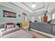 Spacious main bedroom boasts a tray ceiling, seating area, and an ensuite bathroom at 2498 Highway 212, Covington, GA 30016