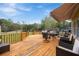 Spacious outdoor deck, perfect for entertaining, with views of the lush surroundings at 255 Deer Run Rd, Ellenwood, GA 30294