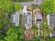 Overhead view displays rooftops and backyards with neat landscaping, set in a neighborhood with trees at 424 Melrose Ave, Decatur, GA 30030