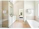 Bathroom with double vanity, walk-in shower and soaking tub at 424 Melrose Ave, Decatur, GA 30030