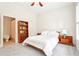 Bright bedroom features a comfortable bed, bookshelf, and ensuite bathroom at 424 Melrose Ave, Decatur, GA 30030