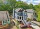 Charming two-story home featuring a well-manicured lawn, a porch, and a private entrance at 424 Melrose Ave, Decatur, GA 30030