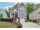 Charming two-story home with a well-manicured yard and a blue exterior at 424 Melrose Ave, Decatur, GA 30030