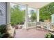 Inviting front porch with ample seating and classic white columns overlooking the neighborhood at 424 Melrose Ave, Decatur, GA 30030