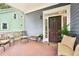 Inviting front porch with seating, perfect for relaxing and enjoying the outdoors at 424 Melrose Ave, Decatur, GA 30030