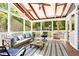 Relaxing screened porch with ceiling fan and comfortable seating area at 424 Melrose Ave, Decatur, GA 30030