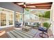 Cozy screened porch with comfortable seating and view of the backyard at 424 Melrose Ave, Decatur, GA 30030