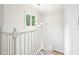 Bright staircase features white railing, crown molding, and natural light at 424 Melrose Ave, Decatur, GA 30030