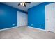 Blue bedroom with carpet flooring and ceiling fan at 4822 Westbourne Dr, Powder Springs, GA 30127