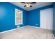 Bedroom features a window and closet space at 4822 Westbourne Dr, Powder Springs, GA 30127