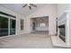 Bright living room with fireplace, ceiling fan, and sliding glass door offering seamless indoor-outdoor living at 4822 Westbourne Dr, Powder Springs, GA 30127