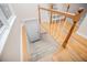 View of wood and carpeted staircase to basement at 4822 Westbourne Dr, Powder Springs, GA 30127