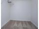 Empty walk-in closet is carpeted at 4822 Westbourne Dr, Powder Springs, GA 30127