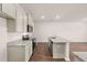 Kitchen showcasing stainless steel appliances, granite countertops, and a kitchen island with sink at 339 Elgin Dr, Lawrenceville, GA 30045