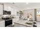 Bright kitchen features granite countertops, stainless steel appliances, and a spacious island at 339 Elgin Dr, Lawrenceville, GA 30045