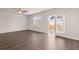 Neutral walls and hardwood floors are featured in the open and airy living space at 339 Elgin Dr, Lawrenceville, GA 30045