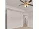Neutral main bedroom with a ceiling fan and an en-suite bathroom at 339 Elgin Dr, Lawrenceville, GA 30045