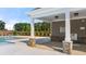 Covered pool house featuring stone columns with a convenient water fountain for hot days at 339 Elgin Dr, Lawrenceville, GA 30045