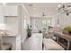 Open-concept living room features hardwood floors and plenty of natural light from large windows at 5128 Noble Village Way # 35, Lilburn, GA 30047