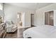 Bright and spacious main bedroom featuring hardwood floors with access to the bathroom at 5128 Noble Village Way # 35, Lilburn, GA 30047