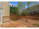 Wooden back deck offering an outdoor living space with wooded views at 1530 Wehunt Se Cir # 19, Smyrna, GA 30082