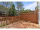 Wooden back deck offering an outdoor living space with wooded views at 1530 Wehunt Se Cir # 19, Smyrna, GA 30082