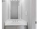 Small bathroom showing white vanity with sink and large mirror, providing a functional space at 1530 Wehunt Se Cir # 19, Smyrna, GA 30082