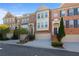 Beautiful townhomes in a desirable neighborhood featuring brick facade, two car garages, and manicured lawns at 1530 Wehunt Se Cir # 19, Smyrna, GA 30082
