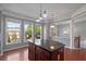 Modern kitchen with center island and large windows with views of the yard at 1530 Wehunt Se Cir # 19, Smyrna, GA 30082