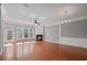 Open living room area with hardwood floors, fireplace, and access to backyard at 1530 Wehunt Se Cir # 19, Smyrna, GA 30082