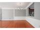 Bright and airy living room with hardwood floors and decorative wainscoting at 1530 Wehunt Se Cir # 19, Smyrna, GA 30082