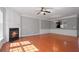 Living room featuring a fireplace, wainscoting, and hardwood floors at 1530 Wehunt Se Cir # 19, Smyrna, GA 30082