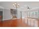 Spacious living room with hardwood floors and stairs leading to the second floor at 1530 Wehunt Se Cir # 19, Smyrna, GA 30082