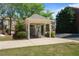 View of the community mailboxes structure showcasing the neat landscaping and neighborhood atmosphere at 1530 Wehunt Se Cir # 19, Smyrna, GA 30082