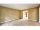 Neutral bedroom with carpeted floors and neutral colored walls at 2055 Springer Walk, Lawrenceville, GA 30043