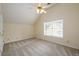 Bedroom featuring vaulted ceiling and carpeted flooring at 2055 Springer Walk, Lawrenceville, GA 30043