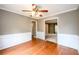 A formal dining room with hardwood floors and access to the living room and kitchen at 2055 Springer Walk, Lawrenceville, GA 30043