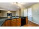 Spacious kitchen featuring an island, and stainless dishwasher at 2055 Springer Walk, Lawrenceville, GA 30043