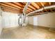 Unfinished basement with exposed ceiling elements, mechanicals, and a sealed concrete floor at 2055 Springer Walk, Lawrenceville, GA 30043