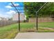 Backyard featuring patio with pergola and lush green lawn at 216 Diamond Valley Pass, Canton, GA 30114