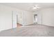 Spacious carpeted bedroom featuring ensuite bathroom and walk-in closet at 216 Diamond Valley Pass, Canton, GA 30114