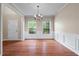 Cozy dining space with hardwood floors, wainscoting, and bright, airy feel at 216 Diamond Valley Pass, Canton, GA 30114