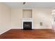 Living room featuring a fireplace, hardwood floors, and natural light at 216 Diamond Valley Pass, Canton, GA 30114