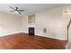 Living room featuring a fireplace, hardwood floors, and natural light at 216 Diamond Valley Pass, Canton, GA 30114