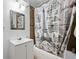Bathroom with a tub and a shower curtain with a Paris theme at 3999 Wabash Ln, Ellenwood, GA 30294