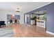 Spacious living area flows into dining and kitchen; hardwood floors, contemporary design at 3999 Wabash Ln, Ellenwood, GA 30294