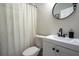 Clean bathroom with a sleek vanity, modern fixtures, and a patterned shower curtain at 831 Catherine St, Forest Park, GA 30297