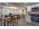 Open-concept layout connecting the kitchen, dining, and living areas, with modern decor and ample natural light at 831 Catherine St, Forest Park, GA 30297