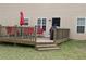 Outdoor deck with ample seating and a grill, ideal for entertaining and relaxing outdoors at 8871 Jimmy Lee Cir, Jonesboro, GA 30238